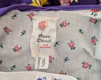 Closeup of label inside women's German dirndl dress, embroidered - "Rose-Dirndl Aus Bayern"