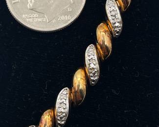Closeup of sterling silver (and gold plated alternating links) bracelet