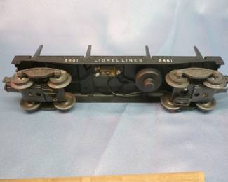 Another view of Lionel Trains Automatic Lumber Car No. 3461 post-War 1949-53, original box in slightly damaged condition; with black plastic log dump bin, 3 logs with instruction sheet