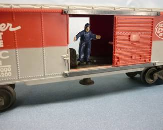 Another view of Lionel Trains Operating Box Car (New York Central/Pacemaker) No. 3494, Post-War 1955 with original box in good condition with instruction sheet. Gray painted on red body casting