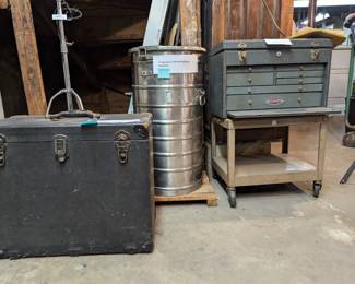 A large vintage carrying case, a vintage Aervoid thermal food carrier model #101, and a Crafstman metal tool chest with locking lid