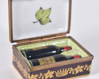 Open view of Limoges France porcelain enameled lidded box - a wine crate with wine bottles inside