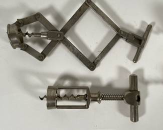 Vintage wine bottle corkscrew, stamped "Made in Switzerland," zig-zag style with concertina action, and a vintage wine bottle metal corkscrew