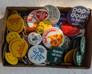 Vintage pinback button collection featuring advertising and politics c. 1960's and 1970's