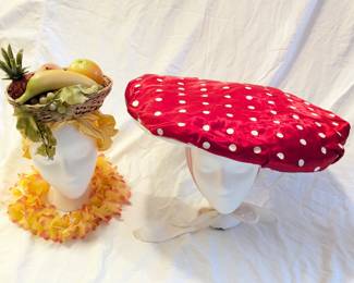 Ladies costume hats including tropical fruit basket and polka-dotted mushroom