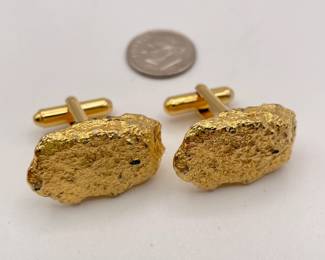 Pair of cufflinks in gold toned metal, with textured gold nugget shape