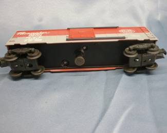 Another view of Lionel Trains Operating Box Car (New York Central/Pacemaker) No. 3494, Post-War 1955 with original box in good condition with instruction sheet. Gray painted on red body casting