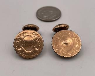 Vintage pair of cufflinks in gold tone metal, engraved Arabic writing on scalloped circles 
