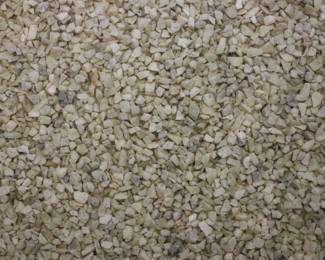 Closeup of surface of 1950's chrome legged terrazzo style coffee table