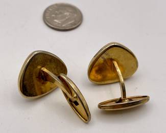 Another view of pair of cufflinks, gold tone metal, agate style stones with thin silver wires