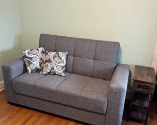 Grey fabric loveseat