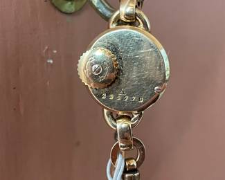 Reverse view of women's vintage Jaeger-LeCoultre Back Wind mechanical watch, outside case marked 294770 A 