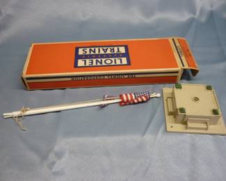 Lionel Trains Flagpole No. 89, post-war 1956-58, original box in excellent condition, 48-star American flag and purple Lionel pennant both in VG condition