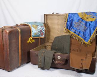 Vintage suitcases, military clothing, flags (one from Fort McClellan, AL)