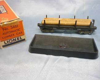 Lionel Trains Automatic Lumber Car No. 3461 post-War 1949-53, original box in slightly damaged 
condition; with black plastic log dump bin, 3 logs with instruction sheet