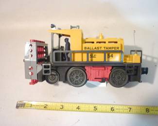 Another view of Lionel Trains Ballast Tamper Locomotive No. 54, Post -War 1958-61, with track clip