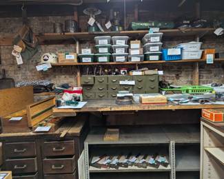 Coleman camp lanterns and propane camp stove, belt sanders, wood planes, specialty hammers, sorted boxes of Allen wrenches, pliers, padlocks with keys, sheet metal clamps, chisels, pry bars, utility knives, awls, wire cutters,  wood chisels, screwdrivers, vice grips, Lyon 18-drawer metal storage/file cabinet