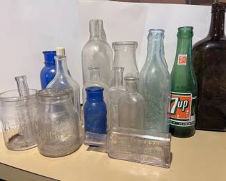 Antique and vintage glass bottles, flasks and jars