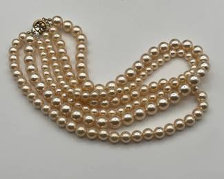 Another view of classic 1950’s three strand Faux Pearl necklace