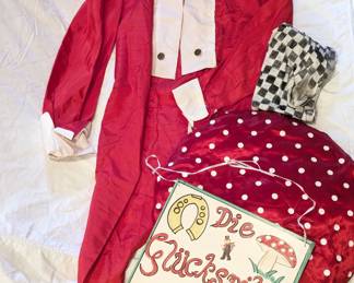 Ladies "mushroom" costume including red long-sleeved coat, large polkadot flat hat,  and signage "Die Gluckspilze"