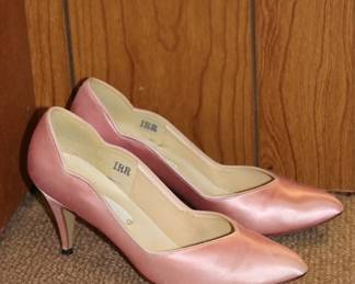 Pair of women's pink satin high-heeled dress shoes