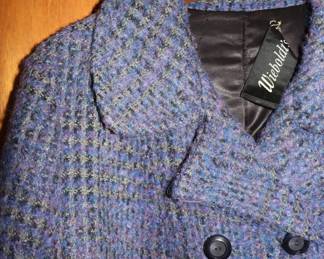 Closeup of women's blue double-breasted coat, boucle material, Wieboldt's label