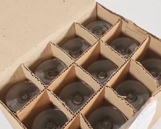 Another view of carton of 12 clear DinkelAcker Privat branded beer glasses
