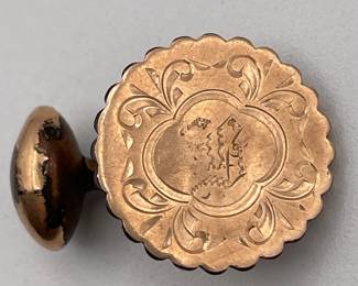 Another view of vintage pair of cufflinks in gold tone metal, engraved Arabic writing on scalloped circles 