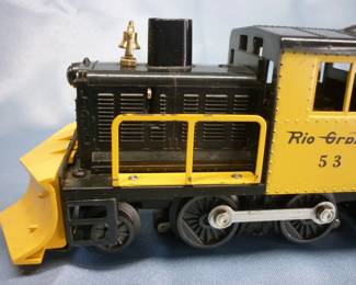 Closeup of Lionel Trains Snow Plow Locomotive (Rio Grande) No. 53, Post-War 1957-60. "a" in "Rio Grande" is backwards; with instruction sheet, with original box in good condition
