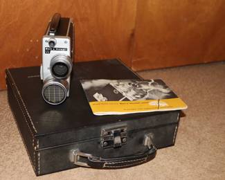 Another view of Bell & Howell Electric Eye Magazine Load 16mm Camera model 200 EE, with original carrying case, manuals, filters