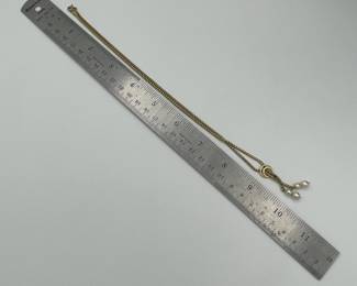 Another view of 14kt gold lariat style necklace