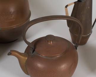 Closeup of hammered copper teakettle