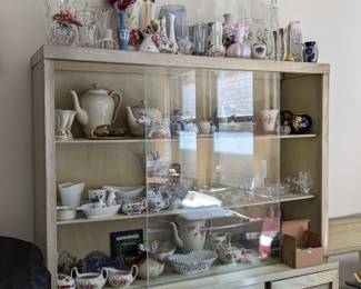 Lots of kitchen wares including porcelain and ceramic pitchers, coffee pots, teapots, creamers, saucers, sugars,  vases and glass/crystal vases