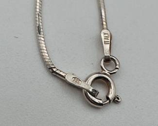 Closeup of clasp on sterling silver Italian necklace with filigree starfish pendant