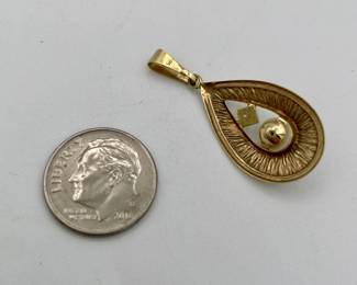 Another view of 14kt gold pendant with diamond and pearl