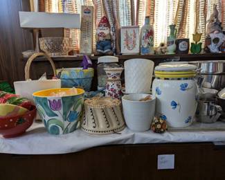 Decorative ceramic bowls, lidded porcelain storage jar, planter pots, metal pitchers, and more