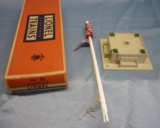Another view of Lionel Trains Flagpole No. 89, post-war 1956-58, original box in excellent condition, 48-star American flag and purple Lionel pennant both in VG condition