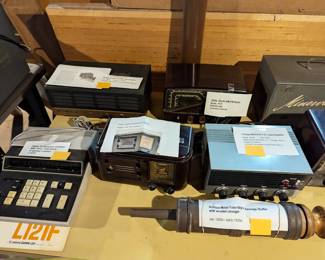 1950s vintage McGohan P.A. tube amplifier model M102,  1950s vintage Heathkit&nbsp;55 watt tube amplifier,
1950s Zenith AM-FM radio model R721, bakelite case,
1970s Canon 121 electronic calculator with "Nixie" bulb display, antique metal tube-style sausage stuffer with wooden plunger, late 1800s/early 1900s