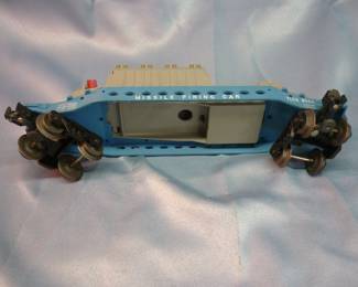 Underside of Lionel Trains Missile Firing Car No. 6544, Post-War 1960-64, with original box and 4 missiles (#44-40), white stamped control panel, with instruction sheet