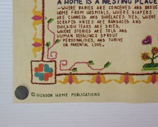 Closeup of poster of "What is a Home" cross stitch embroidery design