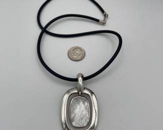 Sterling silver and mother of pearl modernist pendant on cord necklace with sterling clasp