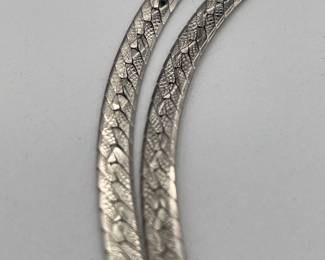 Closeup of texture on sterling silver serpentine necklace
