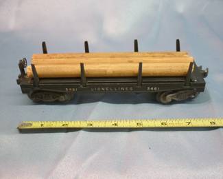 Another view of Lionel Trains Automatic Lumber Car No. 3461 post-War 1949-53, original box in slightly damaged condition; with black plastic log dump bin, 3 logs with instruction sheet