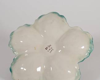 Base of vintage majolica serving dish with cabbage leaves and toadstool design, made in Italy