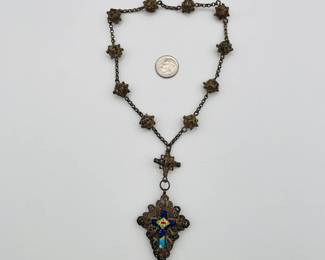 Filigree silver necklace with figural beads and religious pendant with enameled crucifix; likely European