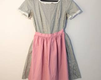 Vintage women's short sleeved dress with pink apron