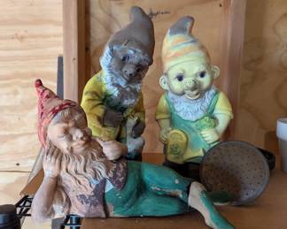 Carved painted garden / gnome figures