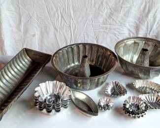 Vintage and antique tin molds for bread baking, bundt cake, various molds for small candies and desserts
