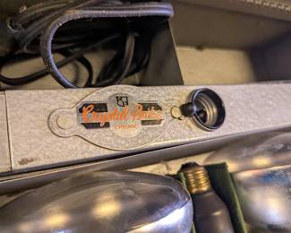 Closeup of vintage Crystal-Brite Chicago lighting set