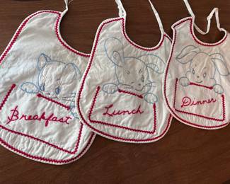 Closeup of hand embroidered bibs